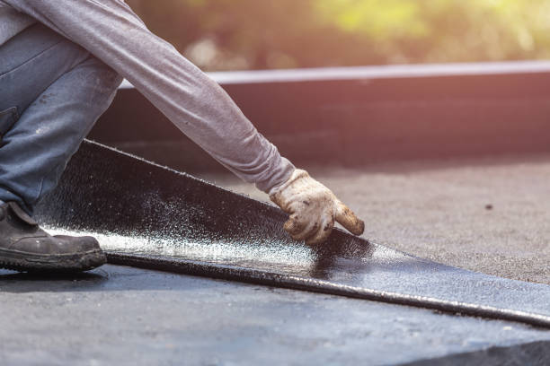 Professional Basement Waterproofing technician working in Telford, TN